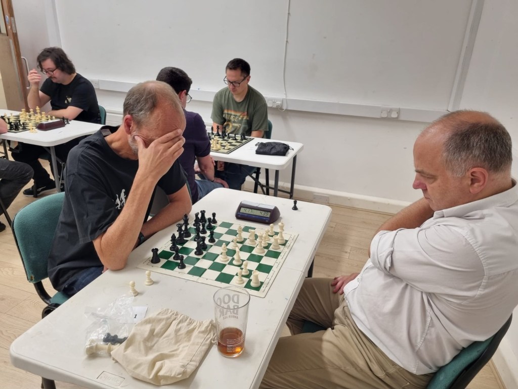 Holger Buckemeyer considers a chess position during Blitz Grand Prix Stage 3.