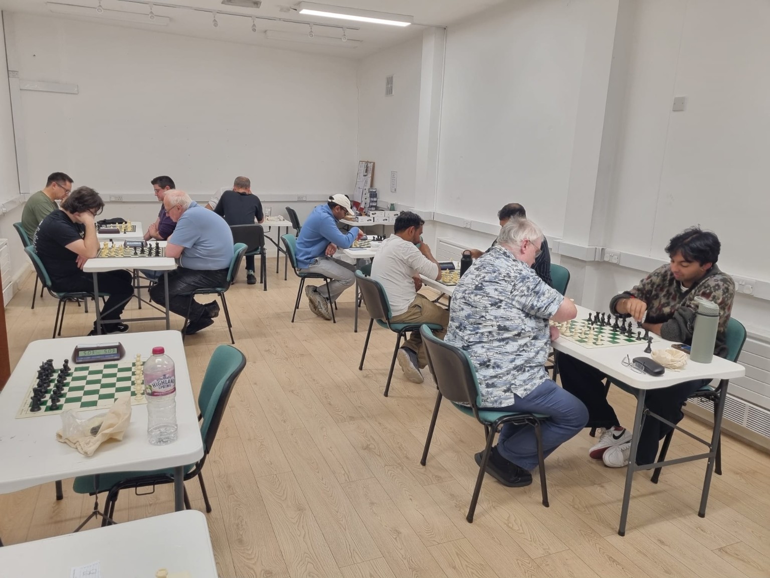 Staines Chess Club members playing several games during a club night at The Literary Institute